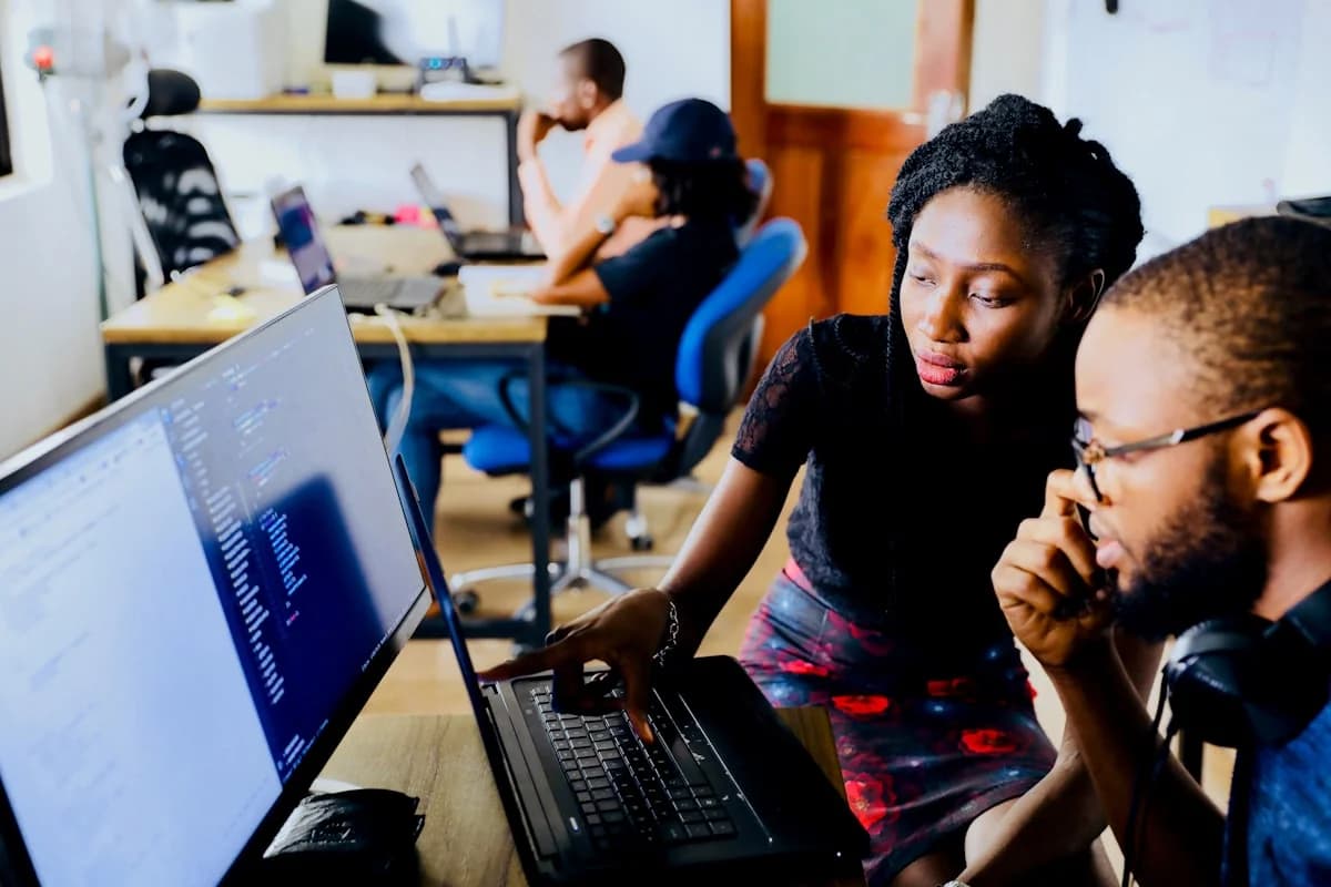 Coworkers reviewing shared knowledge